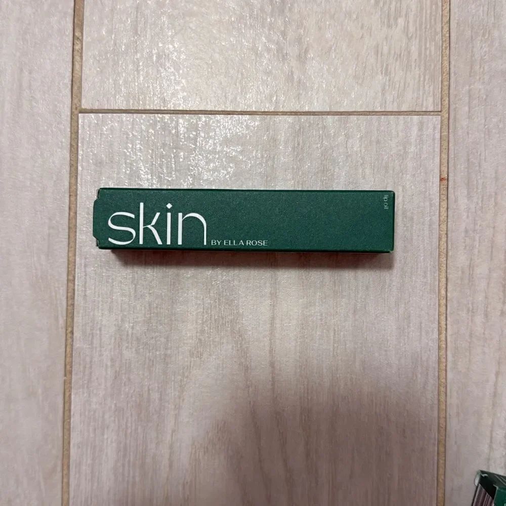 NWT skin by Ella lip oil